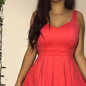 Beautiful corral color dress/heart cutout on back